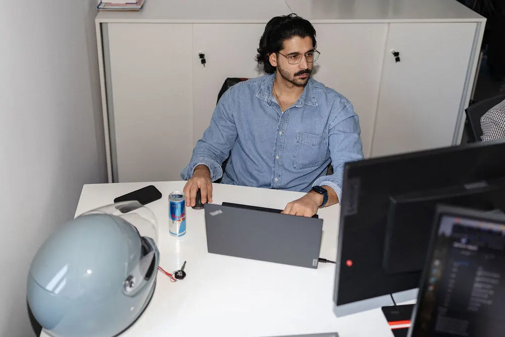 A consultant working at his desk